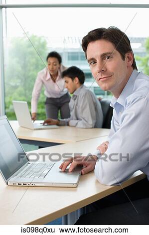 Man in office View Large Photo Image Stock Photograph - Man in office. Fotosearch