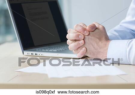 Office worker at desk View Large Photo Image Stock Image - Office worker at desk. Fotosearch