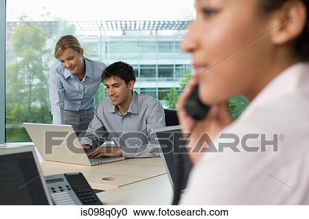 Office workers View Large Photo Image Stock Image - Office workers. Fotosearch