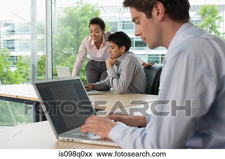 Office workers View Large Photo Image Stock Photo - Office workers. Fotosearch