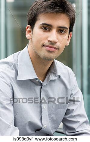 Portrait of a male office worker View Large Photo Image Stock Image - Portrait of a male office worker. Fotosearch