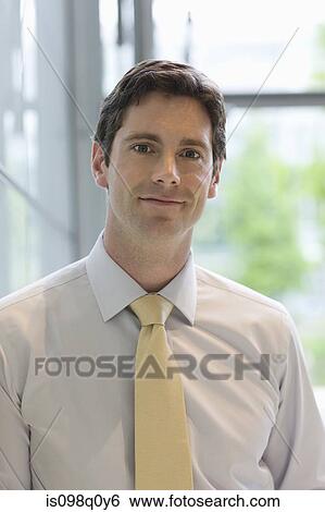 Stock Photograph - Portrait of a male office worker. Fotosearch