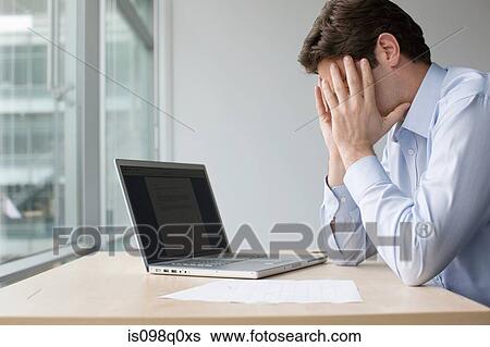 Stressed businessman View Large Photo Image Stock Photograph - Stressed businessman. Fotosearch