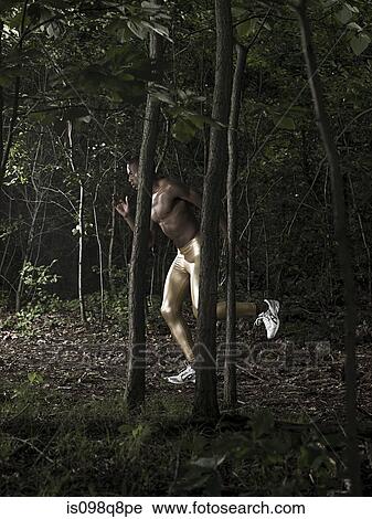 Athlete in forest View Large Photo Image Stock Image - Athlete in forest. Fotosearch
