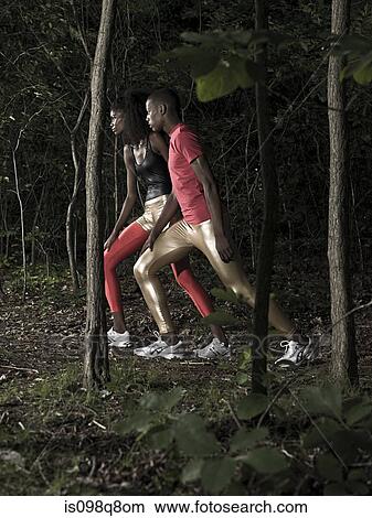 Athletes in forest View Large Photo Image Picture - Athletes in forest. Fotosearch