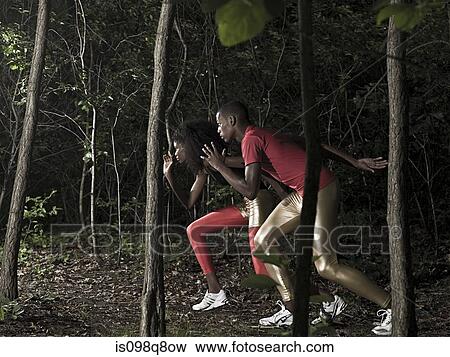 Athletes in forest View Large Photo Image Stock Photo - Athletes in forest. Fotosearch