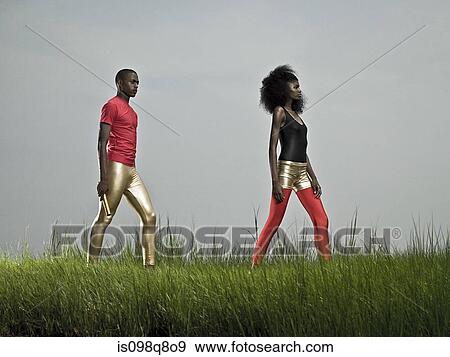 Athletes in relay race View Large Photo Image Stock Photo - Athletes in relay race. Fotosearch