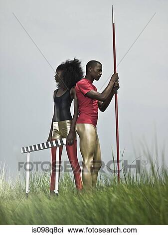 Athletes with hurdle and javelin View Large Photo Image Stock Image - Athletes with hurdle and javelin. Fotosearch