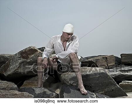 Swimmer on rocks View Large Photo Image Stock Photography - Swimmer on rocks. Fotosearch