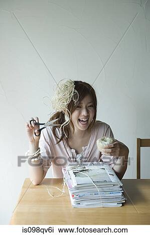 Young woman with string and magazines View Large Photo Image Stock Image - Young woman with string and magazines. Fotosearch