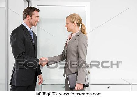 Businesspeople shaking hands View Large Photo Image Stock Image - Businesspeople shaking hands. Fotosearch