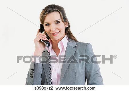 Businesswoman on telephone View Large Photo Image Stock Image - Businesswoman on telephone. Fotosearch