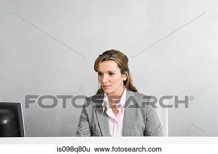 Businesswoman working View Large Photo Image Stock Photograph - Businesswoman working. Fotosearch