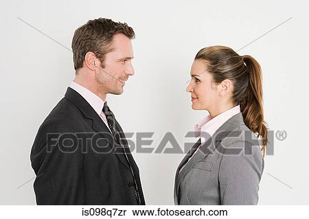Colleagues face to face View Large Photo Image Stock Photography - Colleagues face to face. Fotosearch