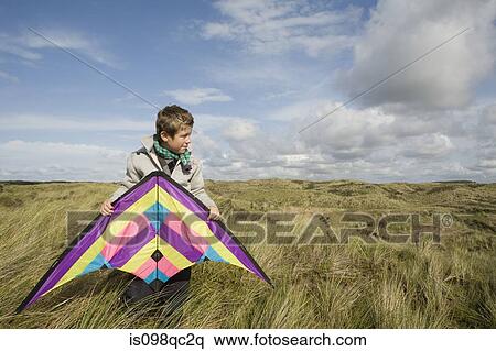 Boy with a kite View Large Photo Image Stock Photography - Boy with a kite. Fotosearch