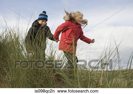Brother and sister outdoors View Large Photo Image Picture - Brother and sister outdoors. Fotosearch
