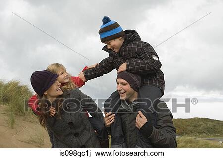 Family at the coast View Large Photo Image Stock Image - Family at the coast. Fotosearch