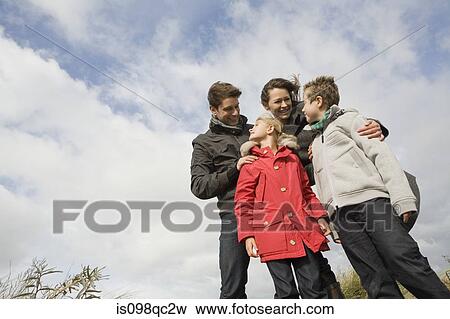 Family outdoors View Large Photo Image Stock Photo - Family outdoors. Fotosearch
