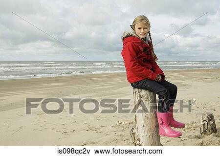 Girl at the beach View Large Photo Image Stock Photo - Girl at the beach. Fotosearch