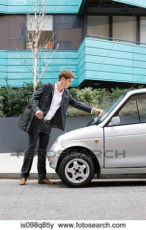 Man with parking ticket View Large Photo Image Stock Photo - Man with parking ticket. Fotosearch