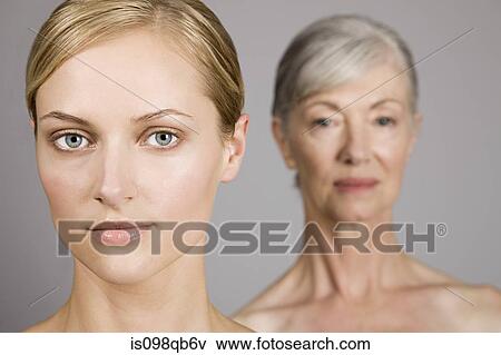 Stock Photo - Faces of young and senior women. Fotosearch