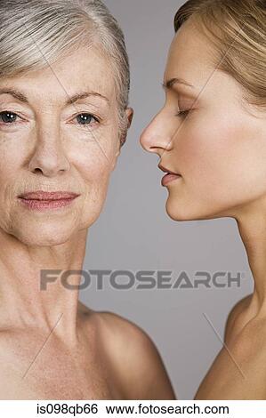 Faces of young and senior women View Large Photo Image Stock Photograph - Faces of young and senior women. Fotosearch