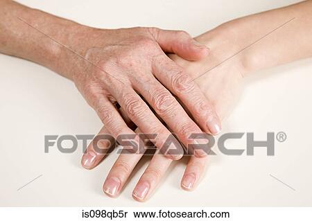 Hands on young and older women View Large Photo Image Stock Photography - Hands on young and older women. Fotosearch
