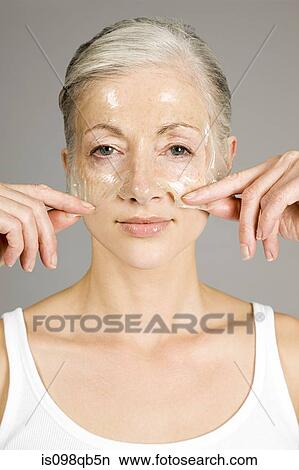 Picture - Woman with anti-aging face mask. Fotosearch
