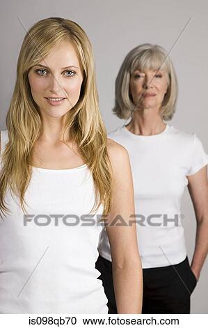 Young woman and senior woman View Large Photo Image Stock Image - Young woman and senior woman. Fotosearch