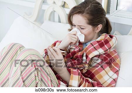Stock Photograph - Ill young woman. Fotosearch