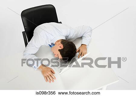 Man asleep on laptop View Large Photo Image Stock Photograph - Man asleep on laptop. Fotosearch