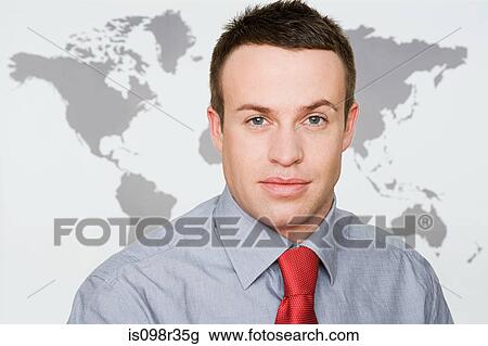 Stock Image - Office worker and world map. Fotosearch