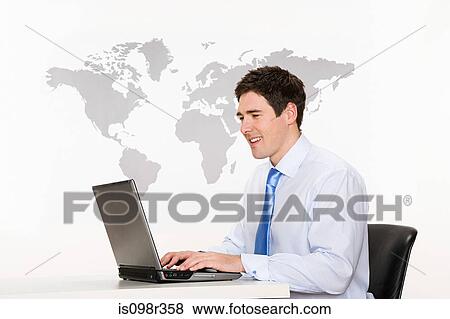 Office worker with laptop and world map View Large Photo Image Stock Photo - Office worker with laptop and world map. Fotosearch