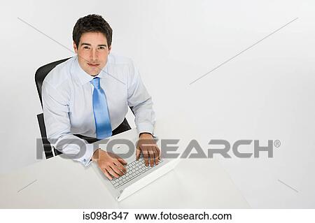 Office worker with laptop View Large Photo Image Stock Photo - Office worker with laptop. Fotosearch