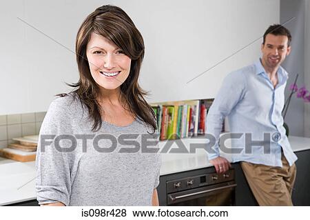 Couple at home View Large Photo Image Stock Photo - Couple at home. Fotosearch