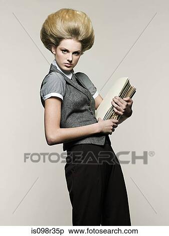 Businesswoman holding files View Large Photo Image Stock Photography - Businesswoman holding files. Fotosearch