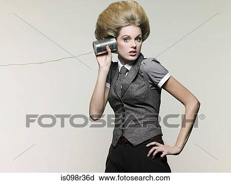 Businesswoman on tin can phone View Large Photo Image Stock Image - Businesswoman on tin can phone. Fotosearch
