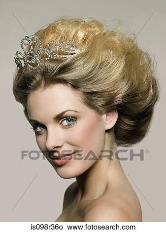 Young woman wearing tiara View Large Photo Image Picture - Young woman wearing tiara. Fotosearch