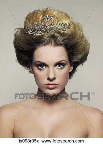 Young woman wearing tiara View Large Photo Image Stock Photo - Young woman wearing tiara. Fotosearch
