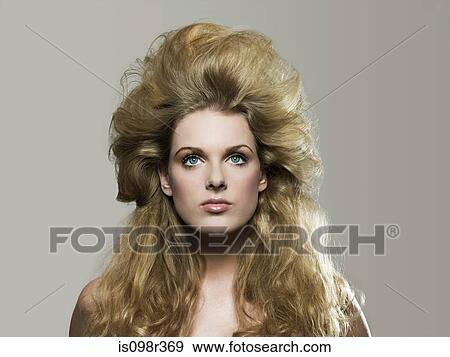 Young woman with looking up View Large Photo Image Stock Photo - Young woman with looking up. Fotosearch