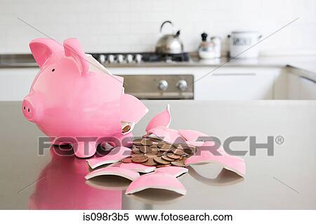 Stock Photography - Broken piggy bank. Fotosearch