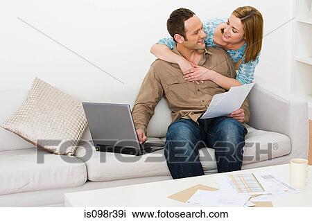 Stock Image - Couple hugging. Fotosearch
