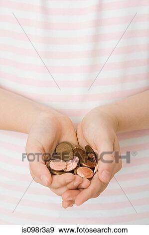 Handful of coins View Large Photo Image Stock Photo - Handful of coins. Fotosearch