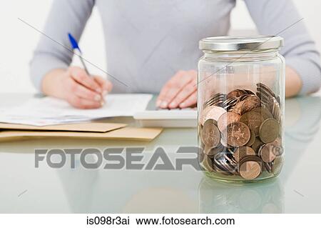 Jar of coins View Large Photo Image Stock Image - Jar of coins. Fotosearch