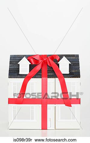 Model house with ribbon View Large Photo Image Stock Photography - Model house with ribbon. Fotosearch