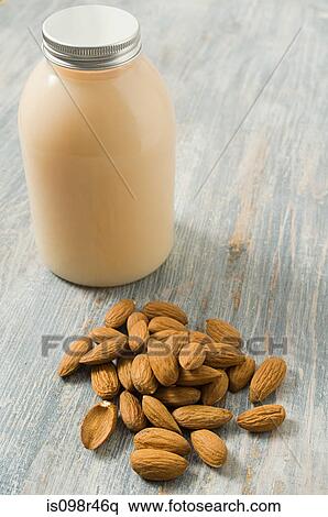 Almonds and body lotion View Large Photo Image Stock Photography - Almonds and body lotion. Fotosearch