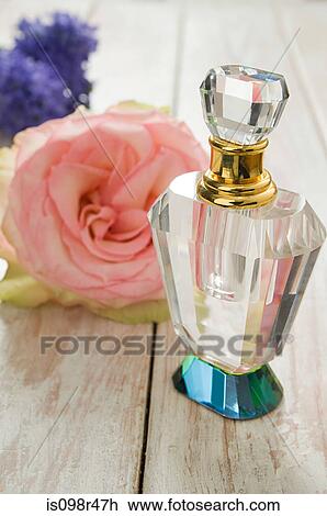 Stock Image - Flowers and perfume. Fotosearch