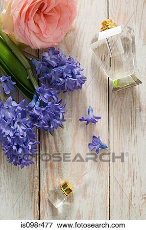 Stock Photo - Flowers and perfume. Fotosearch