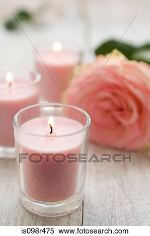 Rose and candles View Large Photo Image Stock Photography - Rose and candles. Fotosearch