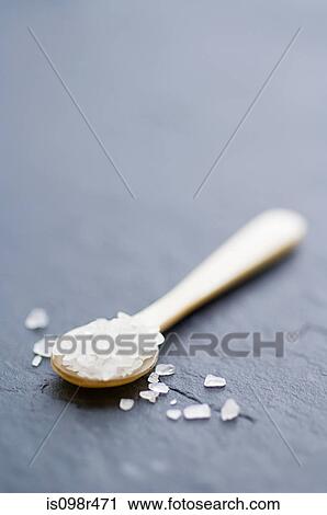 Sea salt on a spoon View Large Photo Image Stock Image - Sea salt on a spoon. Fotosearch